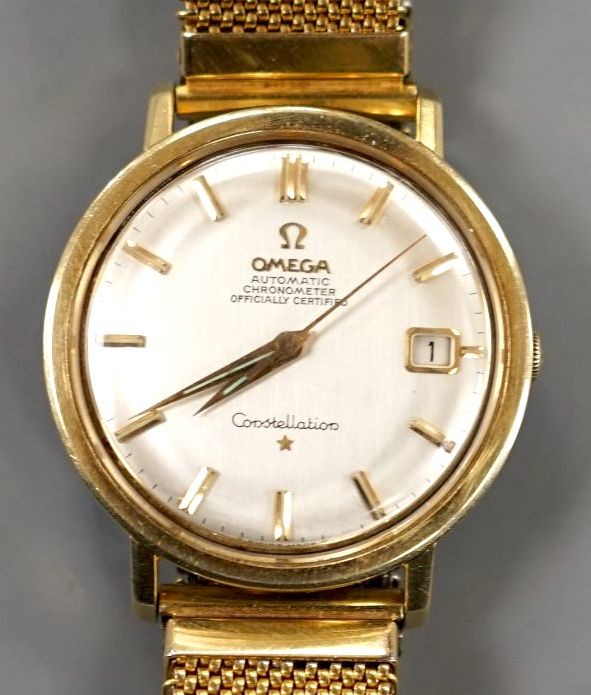 A gentleman's steel and gold plated Omega Constellation automatic wrist watch, on associated flexible strap, case diameter 35mm.